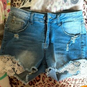 SHEIN essence Guipure Lace insert ripped denim shorts